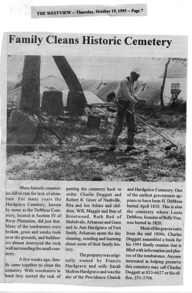 Paper article, family cleans cemetery